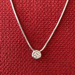 14 Karat White Gold Diamond Pendant 16 inches